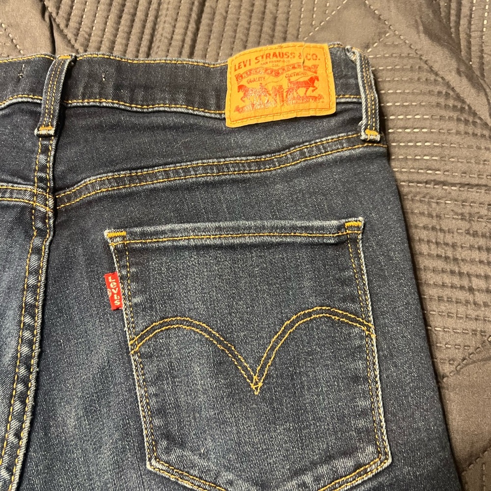 Levi’s size 30 waist 34 inseam dark blue boot cut excellent condition